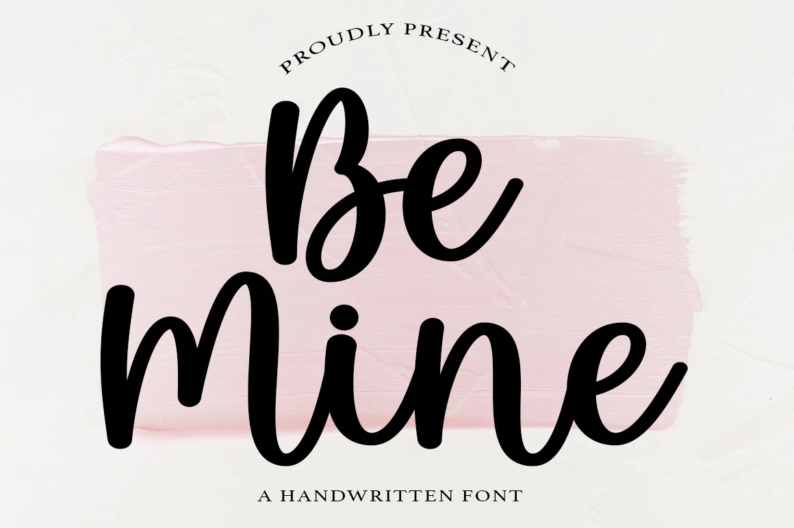 Be Mine Font preview with bold black handwritten lettering over a soft pink brush stroke