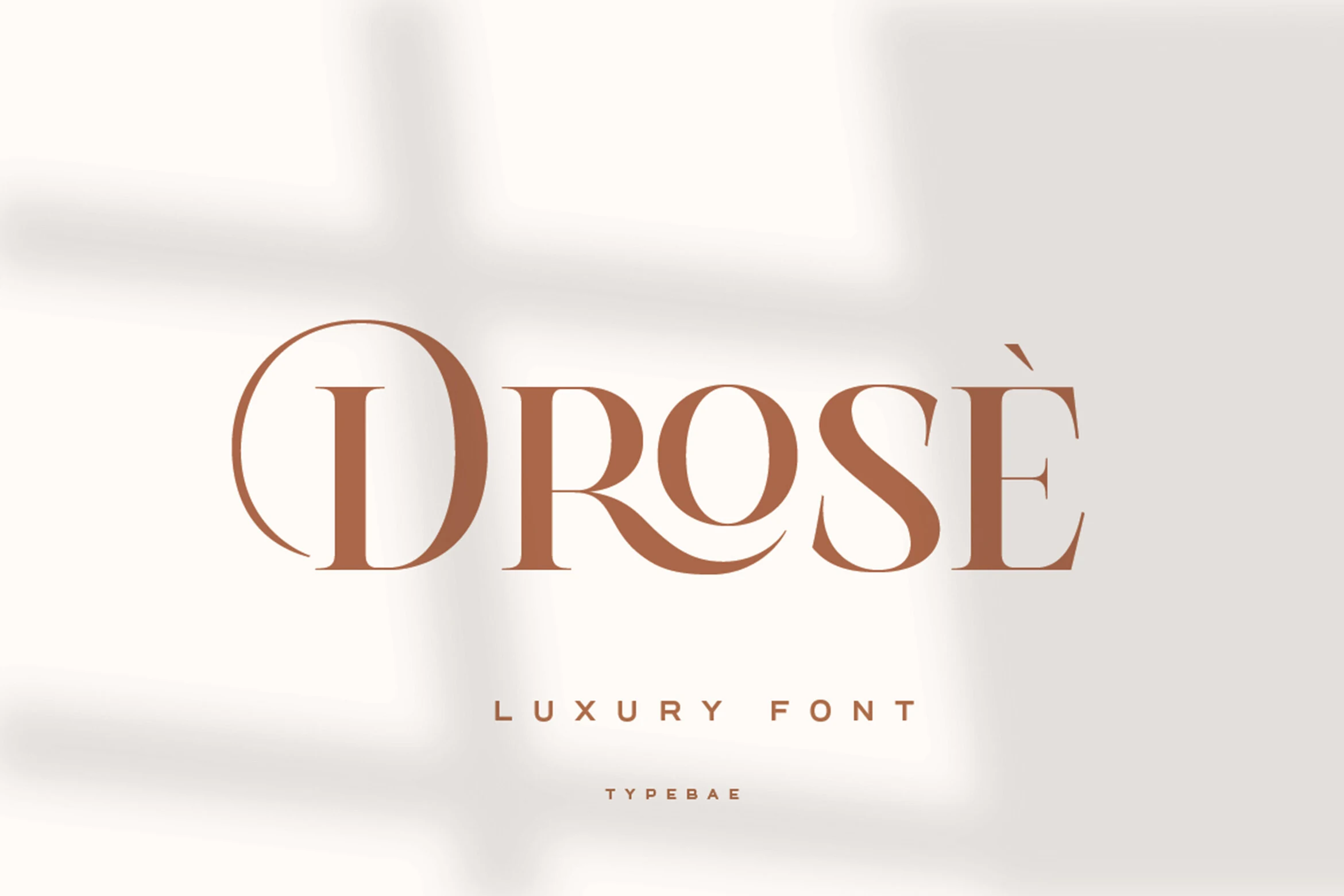 Drose Font preview with warm brown high-contrast serif lettering and elegant curves