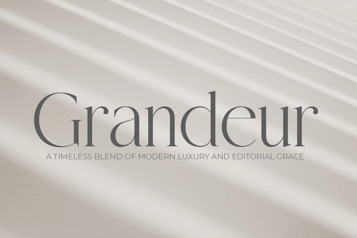 Grandeur – Elegant Classic Serif Font preview with thin high-contrast serif lettering and wide spacing