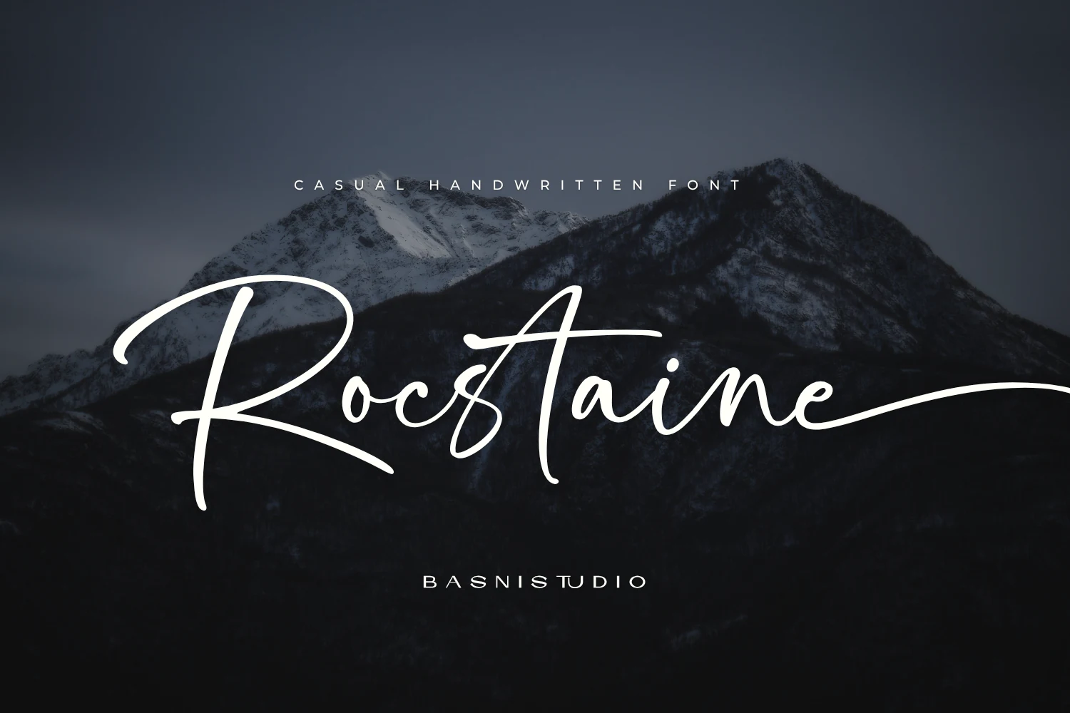 Rocstaine Handwritten Font in a connected, forward-leaning script with monolinear strokes and sweeping swashes.