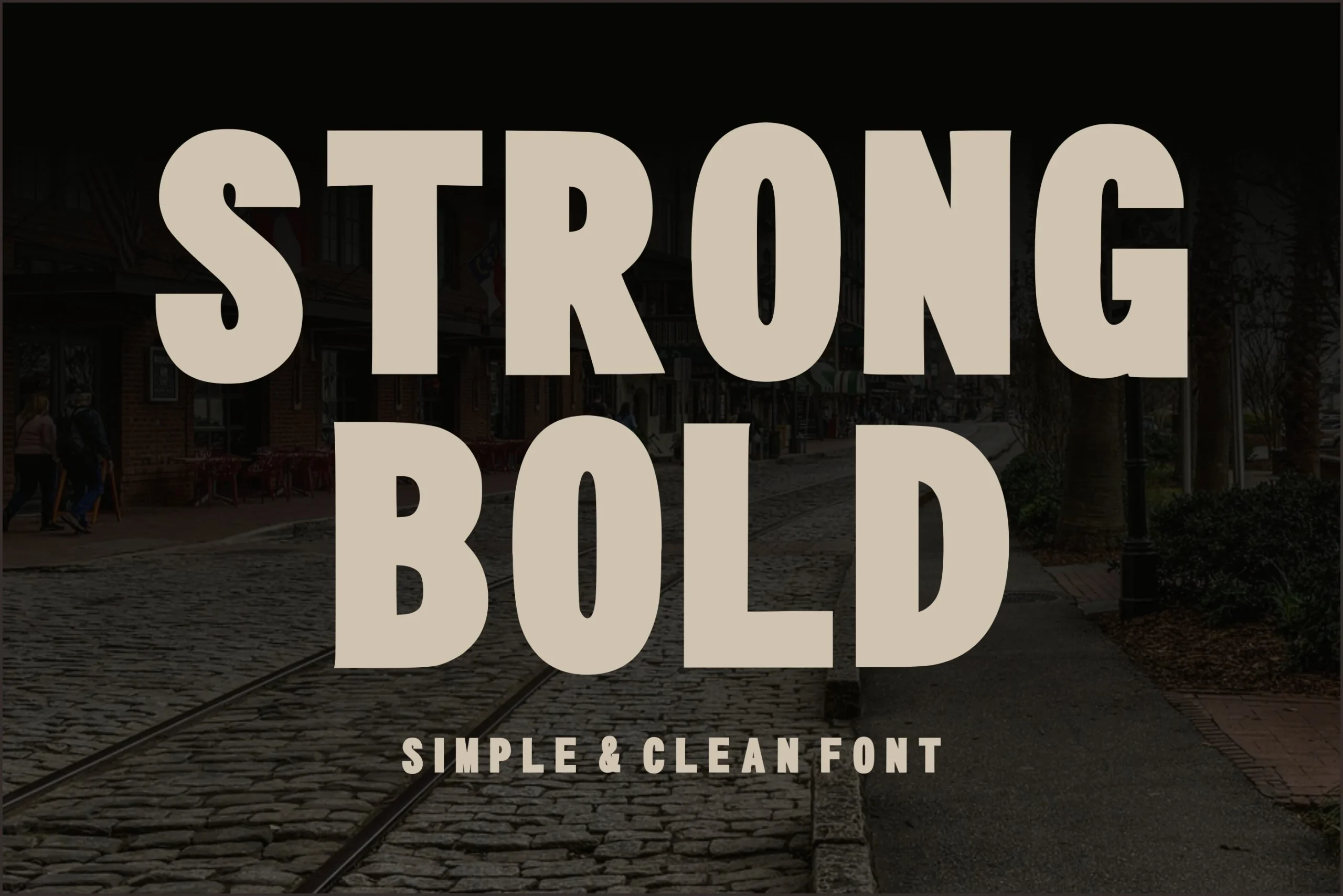 Strong Bold Font is a heavy, condensed sans serif with thick uniform strokes, geometric forms, and squared terminals.