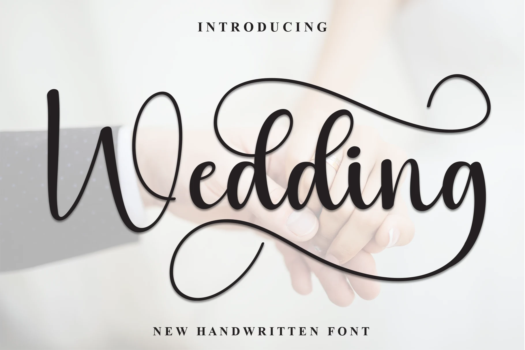 Wedding Font preview with bold black script lettering and long flowing swashes