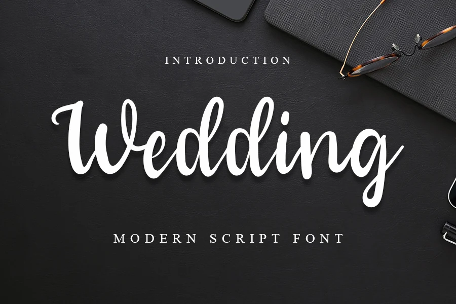 Wedding Font black looping handwritten script with long swashes for wedding invitations
